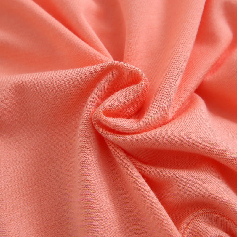 Joyful Coral Bamboo Swaddle Blanket Close Up