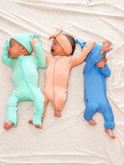 Tranquil Turquoise Zippered Baby Romper