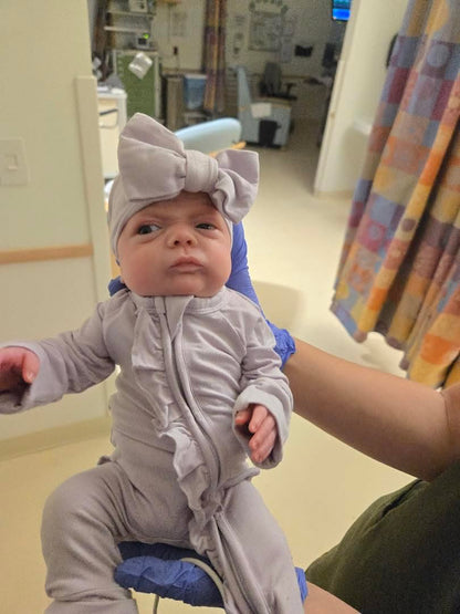 Wisteria Ruffled Zippered Baby Romper