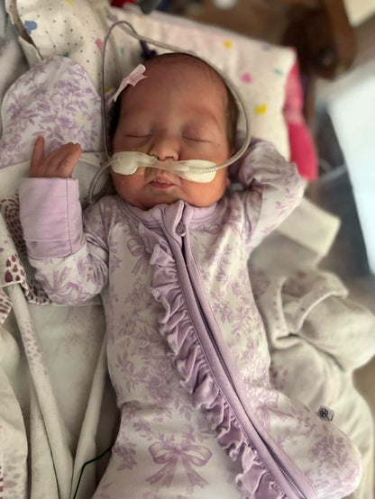 Bows & Blooms Ruffled Zippered Baby Romper